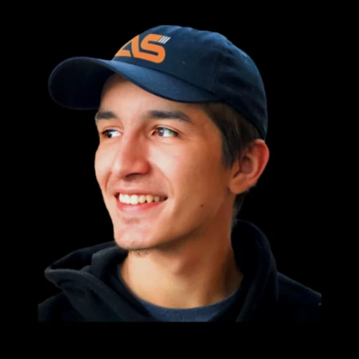 Smiling young athlete in an Area Scouts cap